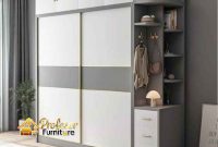 Lemari pakaian pintu geser Depok dengan cermin full body dan laci tersembunyi